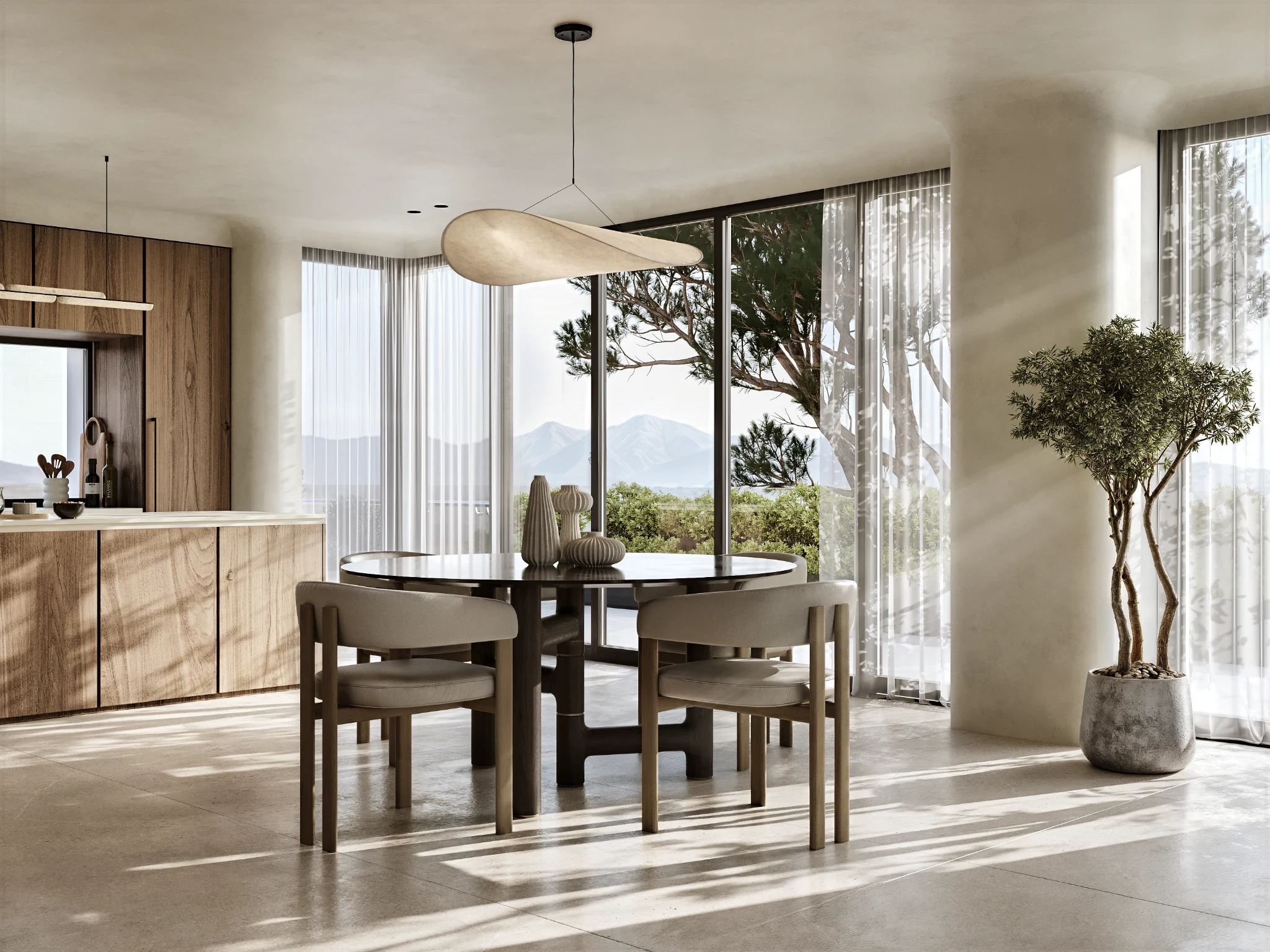 Dining room with a round table, soft chairs and floor-to-ceiling windows